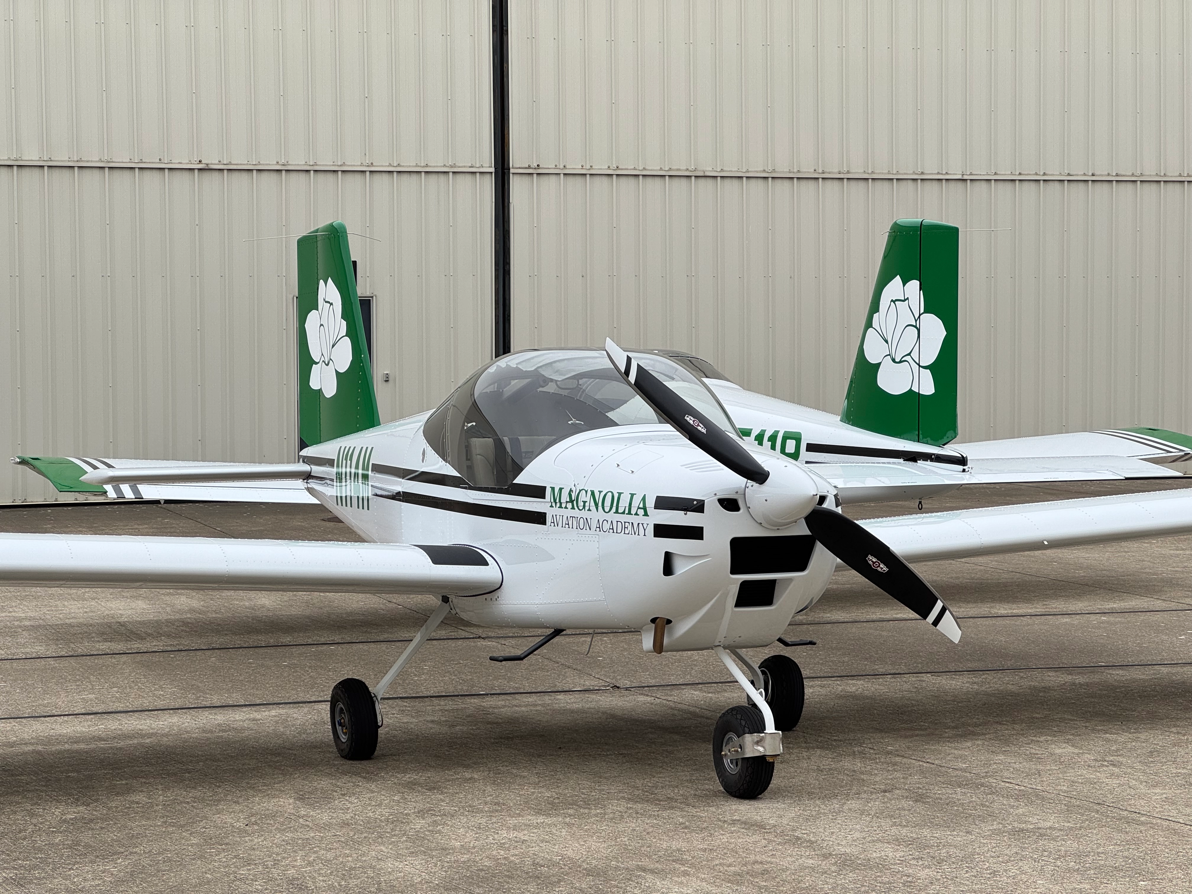Magnolia Aviation Academy training aircraft on the runway ramp