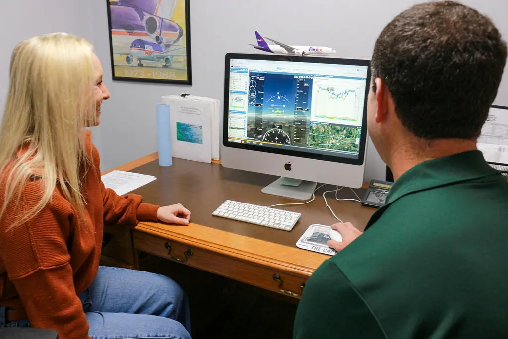 Magnolia Aviation Academy student learning with an instructor