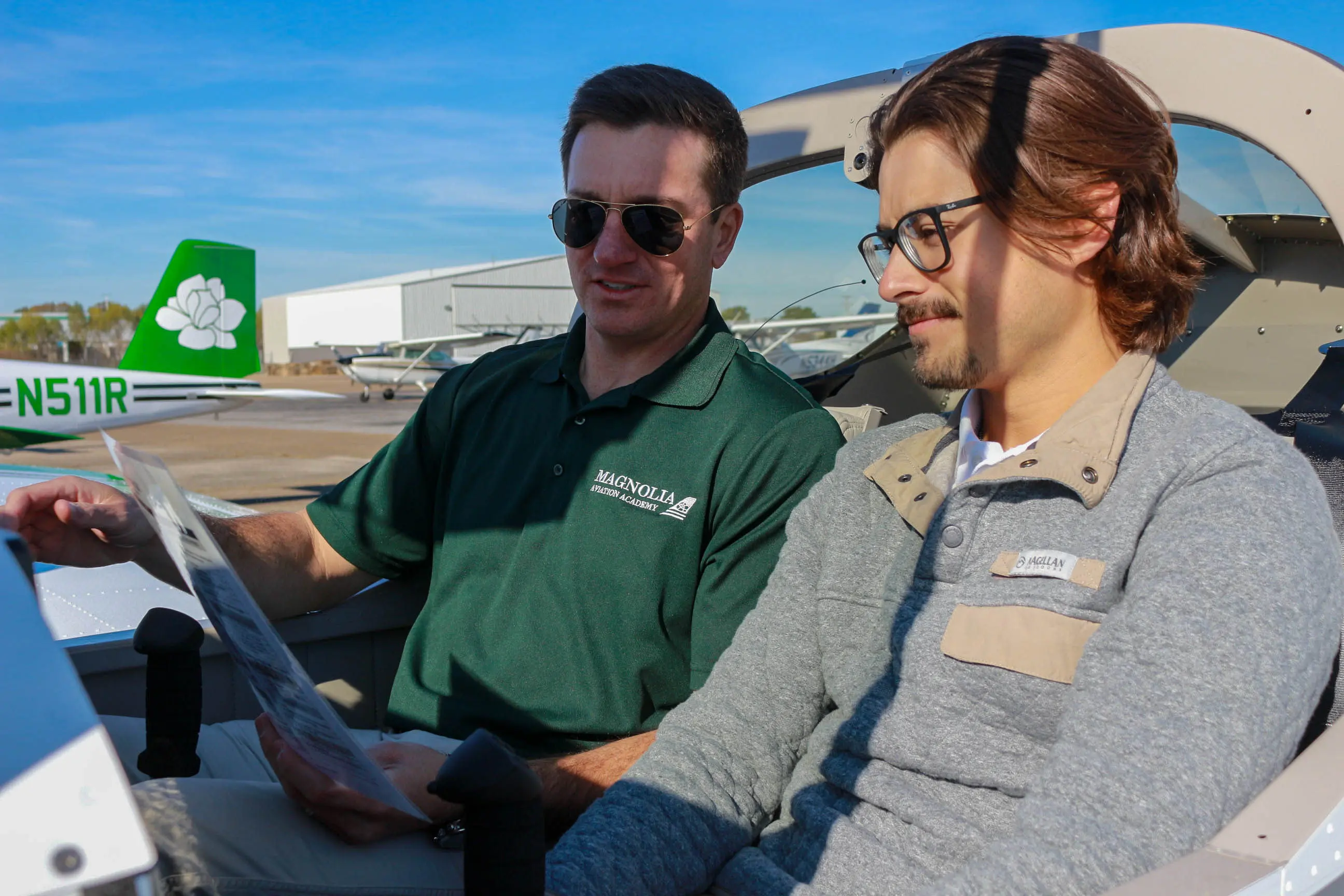 Magnolia Aviation Academy student in an aircraft cockpit