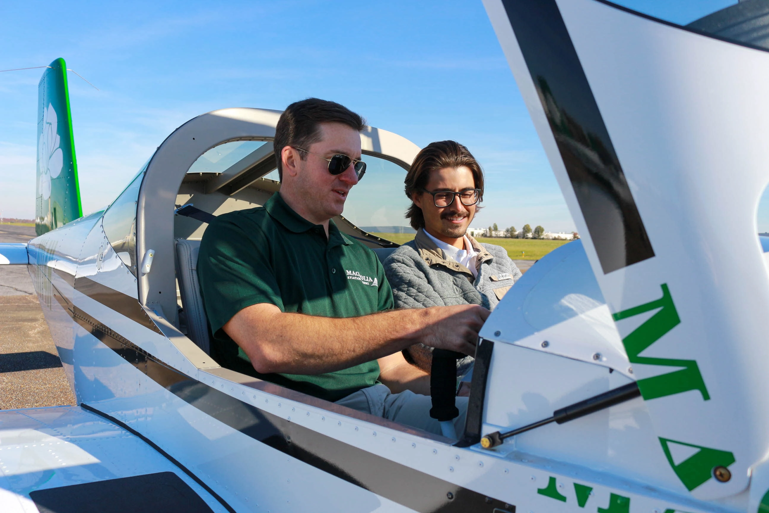 Magnolia Aviation Academy instructor and student inside a training cockpit